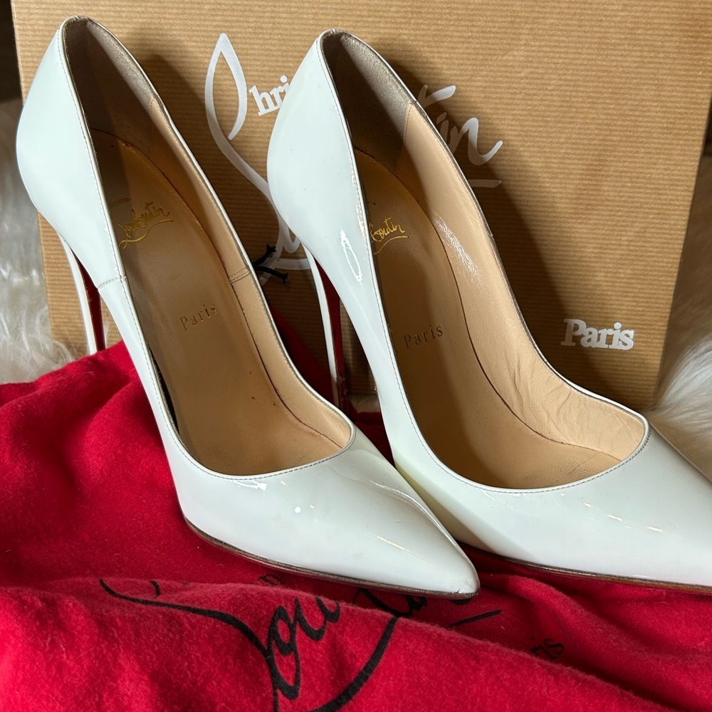 Christian Louboutin size 39.5. White patent with red bottom. Authentic!